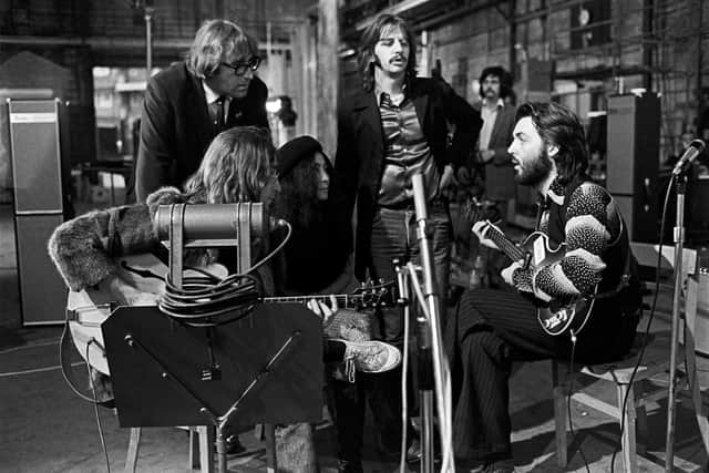 John Lennon, RIngo Starr and Paul McCartney are joined by Mal Evans and Yoko Ono (photo: Ethan A. Russell)