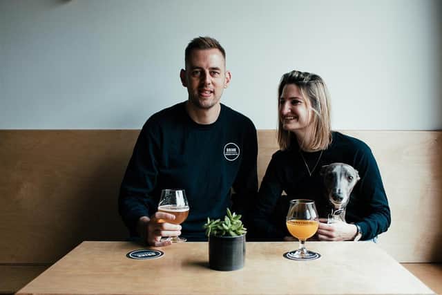 Sarah, Adam, and Henry the whippet from DRINK Biggleswade. Photo: Ginger Snaps Photography.