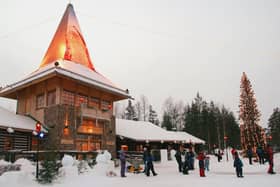 Visitors gather outside of Santa's office at Santa Claus Village - but Central Beds children will only be covering the distance to it virtually.