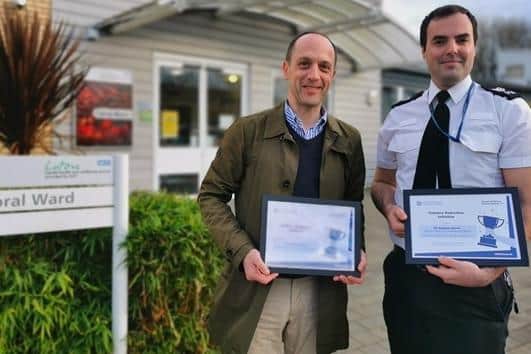 Richard Harwin and Sgt Andrew Harris with their award recognition at the Luton Centre for Mental Health in Dunstable