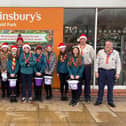 Fundraising for the Jamboree with Nick (left) dressed as an elf.