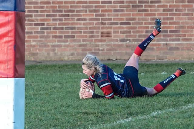 Tash Cooper touches down to score Biggleswade Ladies’ second try in their win over Buckingham Swans 2nd. Picture by David Kay