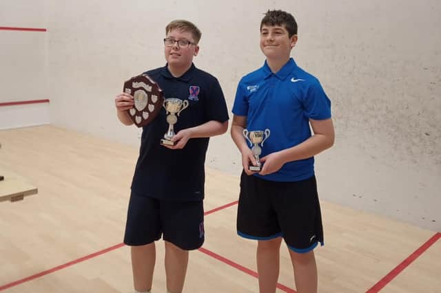 Robbie Leggett (left) was victorious in the U15s category at the Beds County Squash Championships