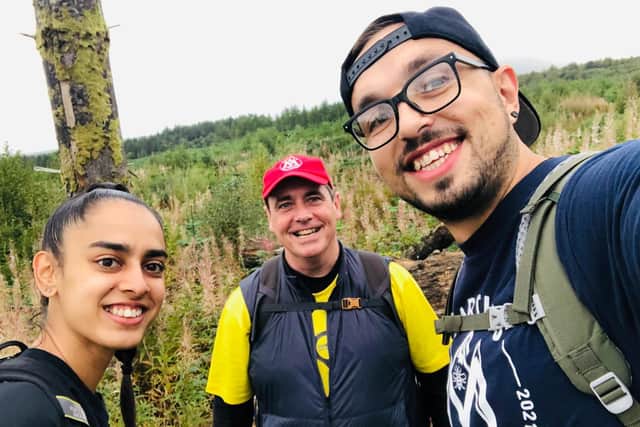 Nadia and Ollie with their friend Graeme - who is also tackling the climb