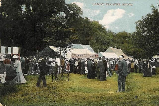 A postcard of The Sandy Show, around 1906.