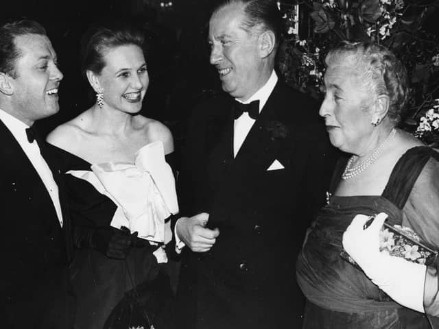 Author Agatha Christie (right) talking to impresario Peter Saunders (centre), actor Richard Attenborough and his wife Sheila Sim, at a party to celebrate her play 'The Mousetrap' (photo: Getty Images)