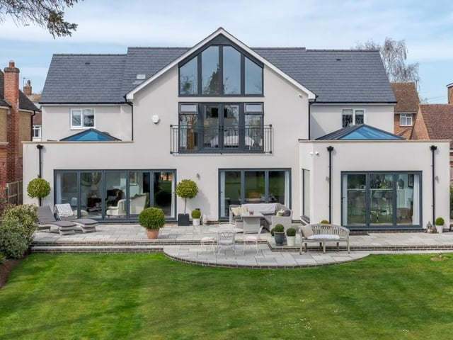 Stunning modern home with a summer house and outdoor kitchen complete with bar