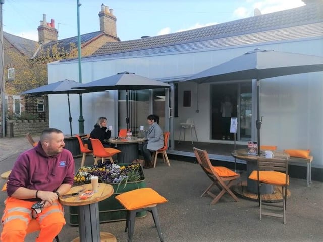 Customers enjoying a morning cup of coffee at Pecoro in the Market Square. Photo: Sandy Town Council.