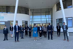 Festus Akinbusoye with Home Secretary Priti Pate during a recent visit to Bedford Academy