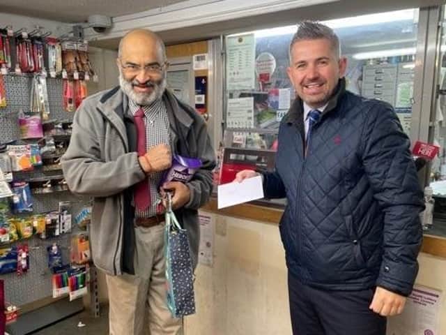 Postmaster Dilip Karavadra with Paul Mead, Post Office Area Manager