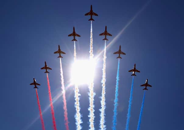 The Red Arrows will fly over Shuttleworth on Sunday (Pic: Getty)