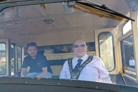 Cllr Mackin receives a ride in the Green Goddess fire engine (from his days in the Auxiliary Fire Service) that was arranged to take him home from the annual town meeting during his last week as Mayor. Photo: Cllr Paul Mackin.