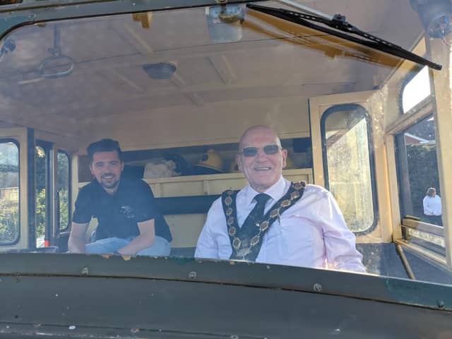 Cllr Mackin receives a ride in the Green Goddess fire engine (from his days in the Auxiliary Fire Service) that was arranged to take him home from the annual town meeting during his last week as Mayor. Photo: Cllr Paul Mackin.