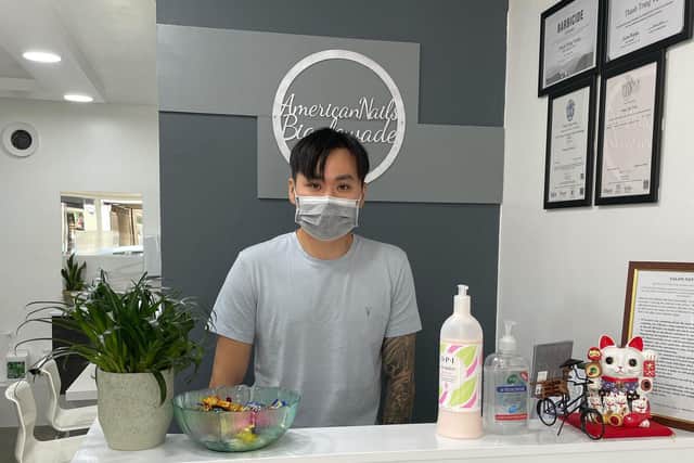 Staff will still wear face masks in American Nails. Photo: American Nails.