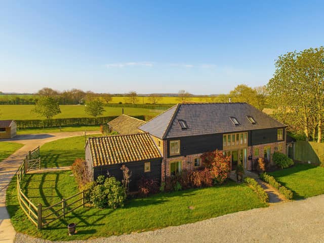 Home Barn is an attractive barn conversion which offers both period charm and modern, open plan living.