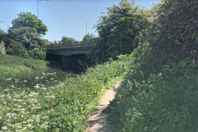 The underpass by the riverside walk is frequently filled with mud and water