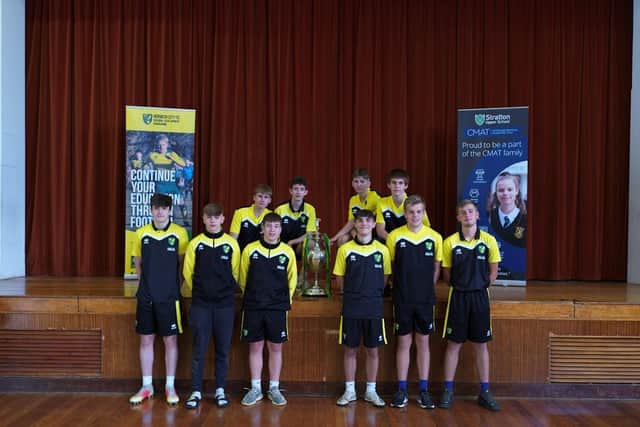 Students with the EFL Championship Trophy