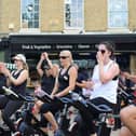 Visitors enjoy a spin class in the Market Square! Photo: BBC.