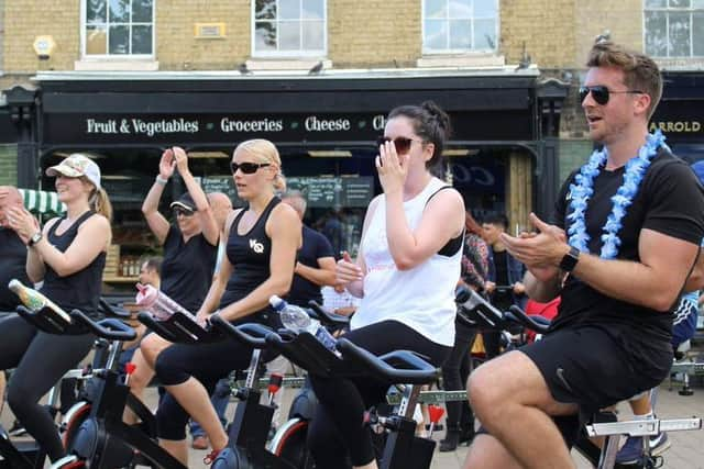 Visitors enjoy a spin class in the Market Square! Photo: BBC.