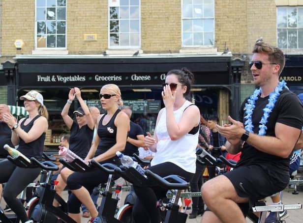 Visitors enjoy a spin class in the Market Square! Photo: BBC.