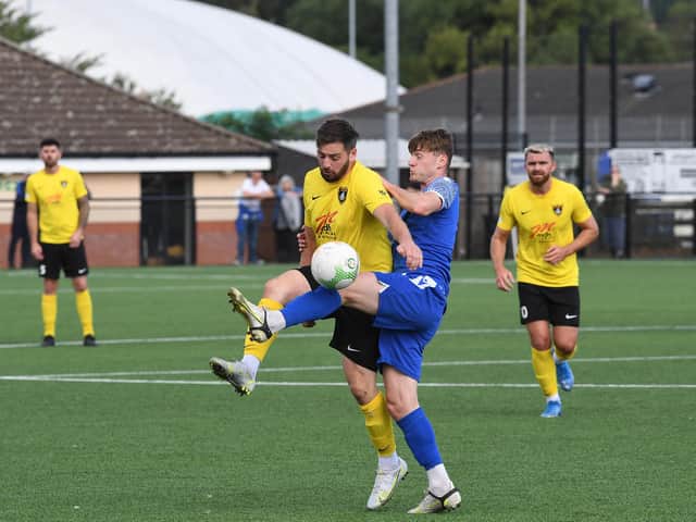 Action from Potton United's 3-1 defeat at Harborough Town last Saturday. Picture by Andrew Carpenter