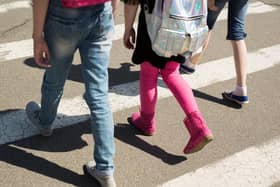Children crossing at a zebra crossing