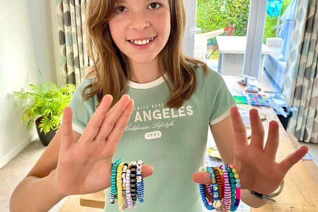 Georgia's EAAA fundraising was bracelet making