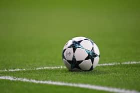 Football sits on a pitch PIC: GABRIEL BOUYS/AFP via Getty Images