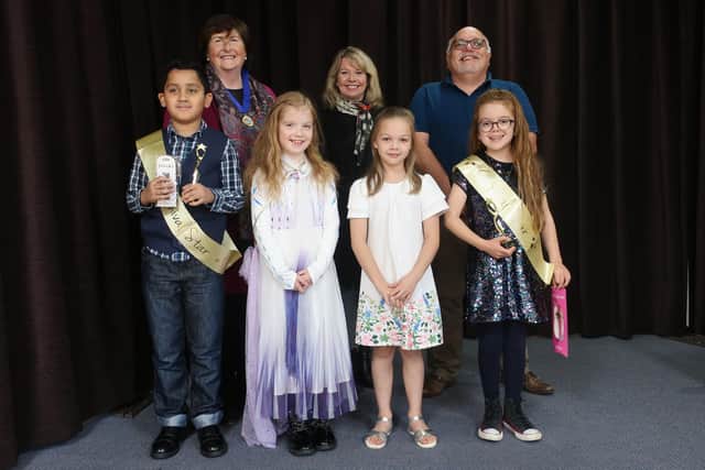 The judges, the 2022 princesses, and winners Gabriel (left) and Ennis (right). Image: Sandy Carnival Association.