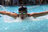 Person swimming in pool