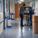 Doctor in a hospital ward. Picture: Jeff Moore PA Images / Alamy Stock Photo