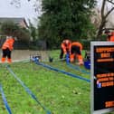 Clearing out flood water in Blunham - Photo credit: Bedfordshire Local Resilience Forum