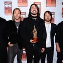 The Foo Fighters attend the 2011 NME Awards together at the O2 Academy Brixton, London. Photo: PA/Ian West.