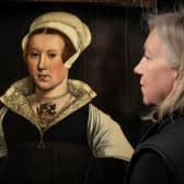 Rachel Turnbull, English Heritage’s senior collections conservator, views the mysterious portrait (Picture: English Heritage)
