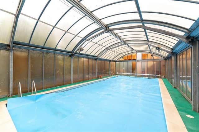 This 5-bed house heated featuring a covered swimming pool with sliding doors is our Property of the Week (Picture courtesy of Michael Graham, Bedford)