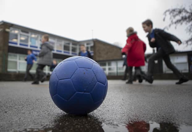 File photo of school children playing.