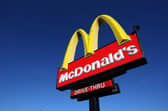 File photo of a McDonald's drive thru sign. (Photo by Justin Sullivan/Getty Images)
