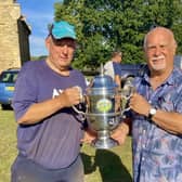 Winner Tony Sinfield (left) receives the Bedford Hospital Cup from former Biggleswade Chronicle sports editor Alan Wooding.