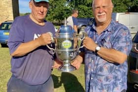 Winner Tony Sinfield (left) receives the Bedford Hospital Cup from former Biggleswade Chronicle sports editor Alan Wooding.