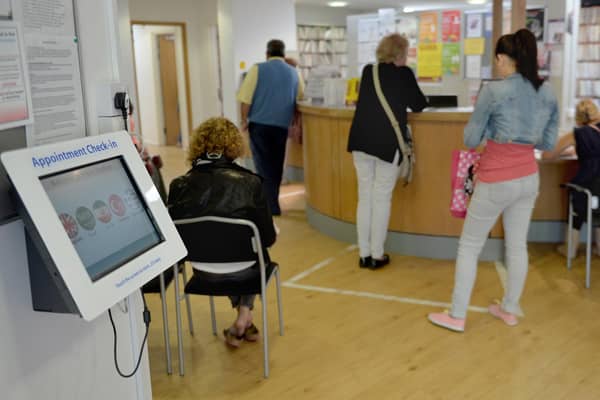 File photo of patients in the waiting room at a GP Practice