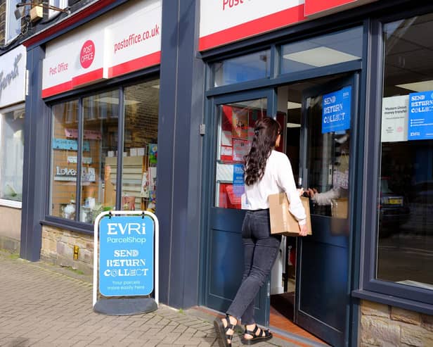 Evri signs in the window of a Post Office branch. Picture: Mark Dolby