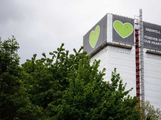 The covered structure of Grenfell Tower in London Photo by Leon Neal/Getty Images