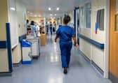 File photo of a general view of staff on a NHS hospital ward