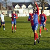 Biggleswade's Taylor Rhiney celebrates one of his two goals against Crawley Green on Saturday. Photo: Patricia González Muñiz/BUFC