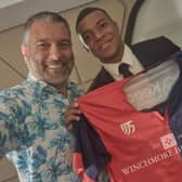 French World Cup star Kylian Mbappe shows his support for Biggleswade United after meeting with club chairman Guillem Balague in Doha.