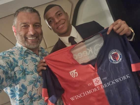 French World Cup star Kylian Mbappe shows his support for Biggleswade United after meeting with club chairman Guillem Balague in Doha.