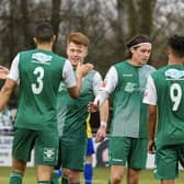 Biggleswade FC's Alex Marsh is congratulated after completing his hat-trick against Hertford. Photo: Guy Wills.