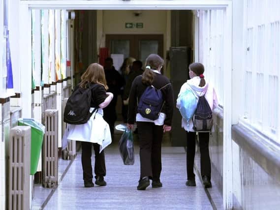 File photo of pupils in a school corridor