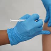 Older people are being urged to  get their Covid and flu jabs as cases rise