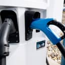 Part of an electrical vehicle charging station (Photo by SAUL LOEB/AFP via Getty Images)